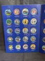 Colored Set 25 cents 50 states and 6 territories USA 1999-2009, in album