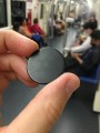 Subway token, subway, Bangkok, Thailand, black