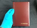 Album by 150 cell, 10 sheets. The size of the cells - 35x35 mm AM-150 (burgundy)